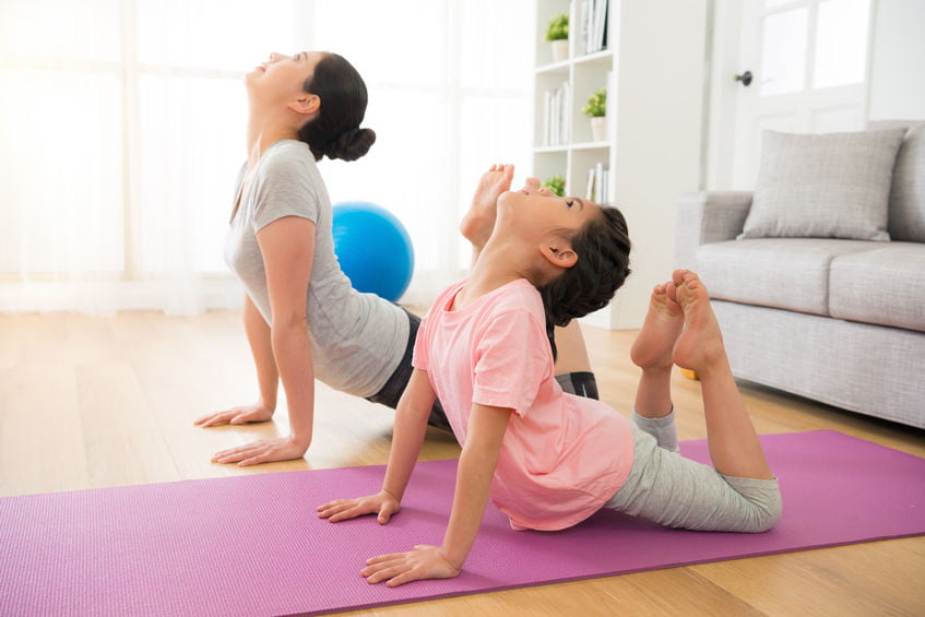 Mother Son doing yoga at home during lockdown