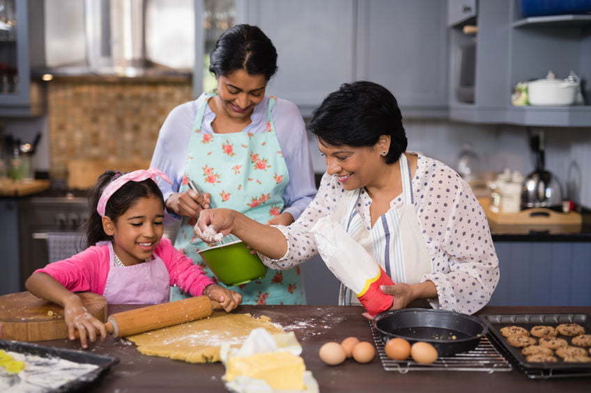 Mother daughter enjoying kitchen time during lockdown